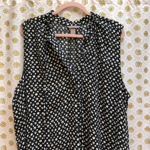 Never worn. H&M Size 22 blouse.